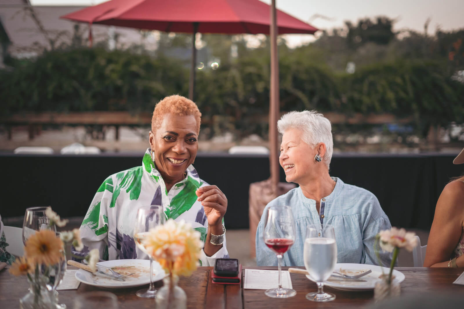 Two women dining outdoors