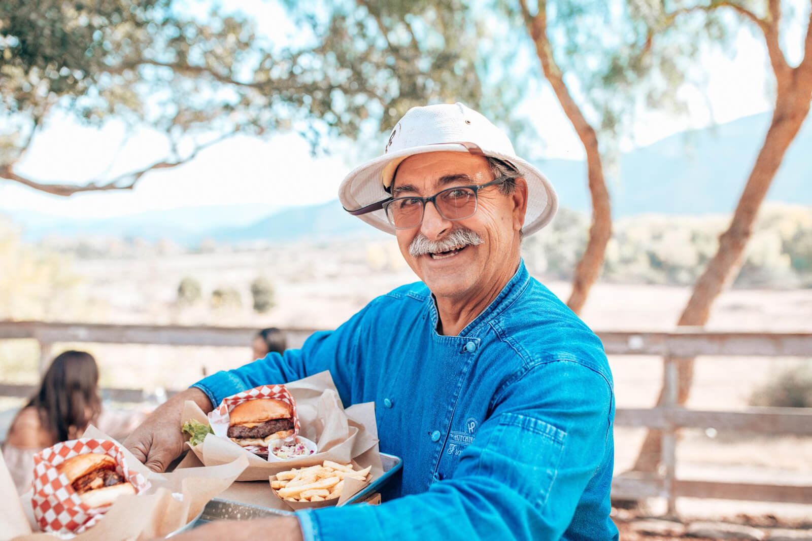 Man carrying food outside in Buellton